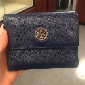 Tori burch wallet. Small pink stain on inside.